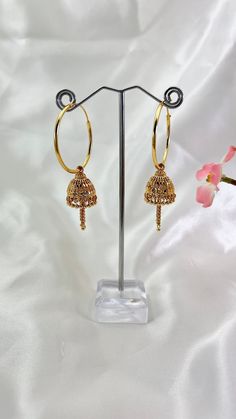 Gold plated Jhumka Baali Hoop Earrings . Total length of the Earrings is 7cm . Ritual Chandbali Jhumkas, Bohemian Gold Dangle Jhumkas, Festive Ornate Dangle Jhumkas, Intricate Brass Dangle Jhumkas, Festive Ornate Brass Jhumkas, Jhumki Earrings, Hoop Earrings Gold, Jhumka Earrings, Ear Wire