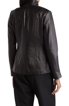 A soft lambskin leather jacket features a wing collar for contemporary style. 22" length Wing collar Long sleeves Front zip closure Front on-seam pockets Lambskin leather construction Lined Shell: 100% leather/lining: 100% polyester Professional leather clean Imported Model stats: 5'10" height, 32" bust, 25" waist, 36" hip. Model is wearing size S. Tailored Modern Leather Jacket For Fall, Tailored Sleek Leather Jacket For Fall, Sleek Tailored Leather Jacket For Fall, Sleek Fitted Leather Jacket For Fall, Leather Biker Jacket For Office, Leather Biker Jacket With Long Sleeves For Office, Tailored Leather Jacket For Fall, Tailored Leather Jacket For Winter, Spring Formal Leather Biker Jacket