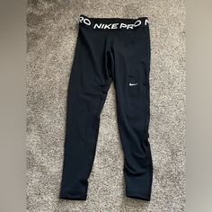 Black, Never Worn, Stretchy Nike Black Full-length Activewear, Black Stretch Nike Tights, Nike Black Leggings For Gym, Fitted Nike Black Tights, Nike Black Stretch Tights, Nike Black Fitted Tights, Fitted Black Nike Tights, Nike Sporty Black Leggings, Nike Black Sporty Leggings