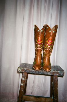 These Eve Doodle Cowboy Boots are each handmade and hand painted with love by artisans in México. Each pair features Eve in the Garden of Eden. As they are made in México, the fit is slightly wider and they run half a size large, so we recommend that half sizes size down.  Our Doodle Boots are handmade and hand painted boots made by Artisans in México using traditional techniques, these cowboy boots are a literal dream come true for us.    This is a very small batch production.  4 inch heel. SIZING DETAILS: As they boots are made in Mexico, they do have a wider fit. The boots run half a size large, so please size down if you are a half size. These Boots Are Made For Walking, Hand Painted Boots, Cute Cowboy Boots, Painted Boots, Bow Flip Flops, Brother Vellies, Fashion Makeover, The Garden Of Eden, Clothing Factory