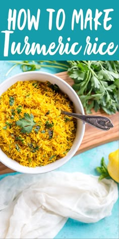 a white bowl filled with yellow rice next to lemons and parsley on a blue surface