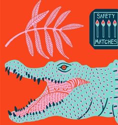 an alligator with its mouth open in front of a palm leaf and safety matches sticker