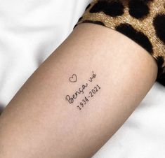 a woman's arm with a tattoo that reads, i love you and the date