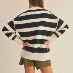 the perfect color block sweater to add to your fall wardrobe. material: 42% acrylic / 30% polyester / 28% nylon care instructions: dry clean only model is 5’7 / wearing a small Party Sweaters, Sweater Layering, Black And White Tops, Stylish Plus, Cozy Fits, Boutique Accessories, Color Block Sweater, Sweater Making, Striped Sweater