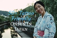 a woman standing next to a river with the words 50 + tattoo friendly onesen in japan