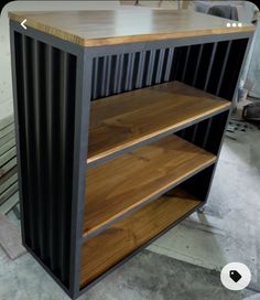 a shelf made out of metal and wood