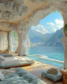 a bedroom with an ocean view is shown