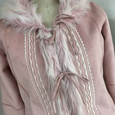 Kick It Back To The Early 2000’s Era W/ This Gorgeous Baby Pink Coat By Kaity. Pink Faux Fur Trim. Embroidered Trim. Faux Suede Patchwork Style. Faux Fur Lined For Extra Warmth. Light Stains Throughout, Photos Shown To Reflect Condition. Two Front Pockets. Tie Closure. Pink Spring Outerwear With Faux Fur Trim, Fitted Pink Outerwear With Faux Fur Trim, Baby Pink Coat, Coats Y2k, Y2k Coat, Suede Patchwork, Toggle Coat, Early 2000’s, Embroidered Trim