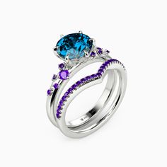 two rings with blue and purple stones on each side, set in white gold plated silver