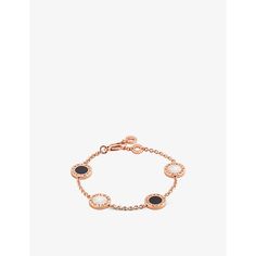 Find BVLGARI 18ct Rose-gold, Mother Of Pearl And Onyx Bracelet S/m on Editorialist. Bvlgari 18ct rose-gold, mother of pearl and onyx bracelet100% rose goldMother of pearl, onyxLobster-clasp fasteningRound, rose gold tone, gemstone embellished, logo engraved, polishedChain type: rope chainChain length: 15-19cmMade in ItalyPlease use a soft, dry polishing clothBvlgari prides itself on providing excellent customer service. This includes contacting customers to offer after-sales care and share detai Luxury Rose Gold Bracelets, Luxury Rose Gold Jubilee Bracelet, Luxury Rose Gold Bracelets With Polished Finish, Luxury Rose Gold Jewelry, Elegant Rose Gold Jewelry With Black Enamel, Onyx Bracelet, Womens Jewelry Bracelets, Mother Of Pearl, Onyx