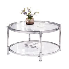 a glass coffee table with flowers on top