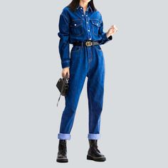 Revive the iconic fashion of the Y2K era with our 2023 Spring-Summer Collection's women's denim jumpsuit! Featuring a sanded medium wash. slim fit. and buttoned closure. this millennial-inspired jumpsuit will take your style game to the next level.Why You'll Fall In LoveThis timeless piece is sure to bring you endless compliments. with its carefully crafted silhouette. vibrant painted prints. and its unique sanded texture. Whether you're out for a picnic. rooftop gathering. or a special evening Dark Wash Non-stretch Denim Jumpsuit, Non-stretch Dark Wash Denim Jumpsuit, Denim Blue Button-up Jumpsuit, Trendy Dark Wash Straight Leg Jumpsuits And Rompers, Trendy Denim Workwear Jumpsuit, Dark Wash Denim Jumpsuits And Rompers With Button Closure, Trendy High Waist Dark Wash Jumpsuits And Rompers, Trendy Denim Jumpsuits For Workwear, Trendy Denim Jumpsuit For Work