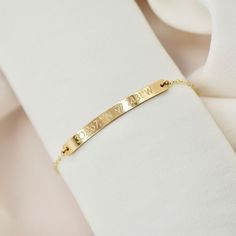 "Coordinate bracelet in 14kt gold filled, rose gold filled or sterling silver. Choose a location that means the most to you! We can also engrave the back with initials or a short saying, just include it in your notes when you check out. This little bar bracelet is engraved with the location of your choice with a Longitude and Latitude . Won't fade, chip or discolor. Wear it all day, everyday! We never take ours off! :) Makes a great gift for bridesmaids, family, friends or a bride-to-be! DETAILS Gold Bar Bracelet, Deer Jewelry, Coordinates Bracelet, Gift For Bridesmaids, Bar Bracelet, Vermeil Jewelry, Bar Bracelets, Gold Plated Bracelets, Silver Bars