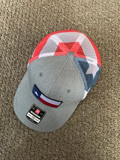 "This is a NEW Texas Flag embroidered patch applied by hand to a high quality Yupoong or Richardson brand SnapBack Trucker style hat Yupoong Classic SnapBacks are 65% Polyester/35% Cotton Structured mid-profile six-panel Permacurv Visor adjustable 6 7/8\" to 7 1/2\" Richardson Hats are 60% cotton/40% polyester Structured mid-profile six-panel Pre-curved Visor adjustable snapback closure 6 3/4\" -7 5/8\" Every Hat Design we offer is Created and Individually HANDCRAFTED to order in the USA! *Due t Hats With Patches, Curved Brim, One Size Fits Most, Trucker Hat With Embroidered Patch Curved Brim, Made In Usa Trucker Cap, Casual Flat Brim Hat With Patches, Trucker Baseball Cap With Embroidered Curved Brim, Trucker Baseball Cap With Embroidered Patch And Flat Brim, Trucker Cap With Embroidered Logo, Embroidered Patch Snapback Hat With Curved Brim, Embroidered Snapback Hat, One Size Fits Most