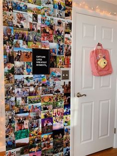 the door is open and there are many pictures on the wall