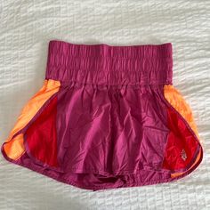 Women’s Fp Movement Shorts, Never Worn Size Large Fp Movement Shorts Outfit, Free People Running Shorts, Free People Game Time Shorts, Free People The Way Home Shorts, Orange Free People Shorts, Fp Movement, Shorts Athletic, Athletic Shorts, Pink And Orange