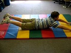 The second exercise to help integrate the Tonic Labyrinthine Reflex (TLR) is called superman. The child will lay on his stomach, put his arms above his head and lift up his arms and his legs so that his knees are off the mat and fly like superman for 15 seconds. Again, 2 sets of 15 seconds for this integration exercise. Stretching Cat, Fetal Alcohol, Sensory Therapy