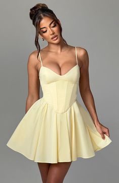 Analeigh is effortlessly dressed up or down, crafted in a lightweight cotton blend with boned corset and sweetheart neckline. With a lace up back for a super cinched waist, the skirt is full and the straps are adjustable for your perfect fit. 



Colour: Lemon.

Premium non-stretch cotton blend fabric.

Fully lined.

Adjustable straps.

Boning in corset.

Sweetheart neckline.

Waist cinching.

Lace up back.

Super full, voluminous skirt.

Invisible zipper fastening.

Mini length.

Model is an XS Corset Back Hoco Dress, Corset Pink Dress, Yellow Dresses Short, Corset Dress Short, Pelo Color Vino, Homecoming Dresses Corset, Yellow Fits, Corset Mini Dress, Maxi Dress Sale