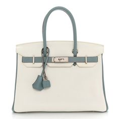 This is an authentic HERMES Togo Horseshoe Birkin 30 in White and Ciel. This Birkin is crafted of Togo calfskin leather in white and blue. The bagfeatures blue leather top handles, a short flap, and a silver palladium lock closure. This opens the bag to a blue leather interior with zipper and patch pockets. White Calf Leather Bag For Formal Occasions, Shopping Bag With Silver-tone Hardware In Epsom Leather, Epsom Leather Bags With Silver-tone Hardware For Shopping, Epsom Leather Bags For Everyday Luxury, White Timeless Epsom Leather Bag, Timeless White Epsom Leather Bag, White Epsom Leather Travel Bag, White Epsom Leather Bag With Palladium Hardware, Everyday Luxury White Bags With Leather Lining