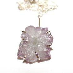 "If you love our raw stone jewelry, this necklace is for you! A delicate sterling silver curb chain is adorned with a raw natural lavender amethyst flower. This iridescent stone is set in a sterling silver prong setting. The chain is adjustable from 15.5\" to 17.5\" (not including the stalactite drop). Love! xoxoxo payton All FizzCandy creations come beautifully boxed and ready for gift giving. Please see our store policies here - https://www.etsy.com/shop/FizzCandy/policy?ref=shopinfo_policies_ Unique Sterling Silver Necklace With Raw Stone, Sterling Silver Pendant Necklace With Raw Stone, Raw Stone Pendant Jewelry For Gifts, Raw Stone Pendant Jewelry As Gift, Sterling Silver Pendant With Raw Stone, Minimalist Silver Jewelry With Raw Stone, Unique Silver Necklace With Raw Stone, Sterling Silver Crystal Necklaces For Healing, Delicate Sterling Silver Necklaces With Natural Stones