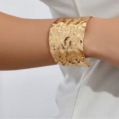 Golden Stylish Chunky Cuff Bracelet Goldish Hammered Pattern More For Smaller Wrists Ships Same Or Next Business Day Smoke And Pet Free Home 5 Star Posher Trendy Cuff Bangle For Parties, Party Open Cuff Bracelet, Gold Open Cuff Bracelets For Party, Open Cuff Bracelet For Party, Gold Open Cuff Bracelet For Party, Chunky Cuff Bracelet, Metal Cuff Bracelet, Blue Beaded Bracelets, Geometric Bracelet