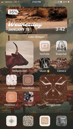 an iphone screen with various images and icons on the front, including deers in the background