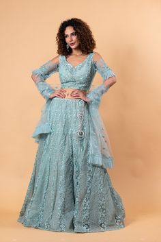 Step into elegance with our Angel Blue Lehenga and Choli, embellished with intricate embroidery and stonework. Radiate beauty in the ethereal angel blue hue, crafted to perfection for effortless glamour. Perfect for weddings or festive occasions. Ethereal Angel, Baluchari Saree, डिजाइनर कपड़े, Golden Blouse, Saree Blouse Styles, Silver Blouse, Sequin Saree, Designer Lehengas, Angel Blue