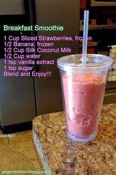 a smoothie in a plastic cup with a straw on the side and instructions to make it