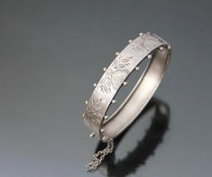 "Antique - Victorian Aesthetic hinged bangle bracelet. Late 19th century, Germany. MADE OF: silver 800. CONDITION: As seen, excellent antique condition. With no loses or dents. Clasp works well. MEASUREMENTS: Inner circumference approx. 6 3/4\" (17,2cm). Wide: 5/8\" or 15mm. Weight: 16,1g. * * * All our items are packed in gift boxes, easy to check of content and re-pack. If you wish something special, please let us know. * * * LAYAWAYS: All items can be put on layaway, max 4 months. First payme 19th Century Germany, Antique Hinges, Christmas Bling, Victorian Aesthetic, Engraved Bracelet, Hinged Bracelet, Black Jewelry, Hinged Bangle, 4 Months