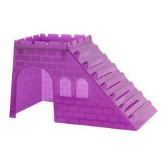 a purple castle with stairs leading up to the door and windows on it's side