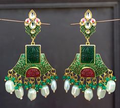 Fancy Party Wear Traditional Earrings. Perfect with ethnic & traditional wear. Perfect gift for any occasion for yourself and your dear ones. It is advisable to store jewellery in a zip lock pouch (air tight pouch), keep away from water perfume and other chemicals and clean it with dry and soft cloth. Traditional Green Danglers For Celebration, Traditional Green Chandelier Earrings For Celebration, Traditional Green Chandelier Earrings For Festive Occasions, Traditional Green Dangle Chandbalis, Traditional Bridal Earrings With Cutdana For Gifts, Green Bollywood Bridal Earrings For Festive Occasions, Bollywood Style Green Bridal Earrings For Festive Occasion, Green Traditional Danglers For Party, Traditional Green Danglers For Party