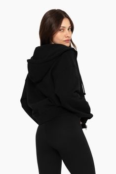 Experience comfort and style with our Zip Hoodie in Onyx. Slightly less oversized than our Oversized Zip Hoodie, it boasts a full-length zipper, patch pockets, hood with drawcord, and ribbed waistband and cuffs. Made from our heavyweight sweats fabric, it ensures coziness. Embroidered with the SET logo on the upper left chest, it adds a fashionable touch to your wardrobe. Oversized Solid Hoodie With Zipper, Oversized Solid Hoodie With Zipper Closure, Oversized Hooded Jacket For Loungewear Athleisure, Cozy Half-zip Hoodie For Loungewear, Oversized Fleece Half-zip Hoodie, Oversized Fleece Hoodie With Half-zip, Sporty Hooded Jacket With Zipper For Loungewear, Sporty Oversized Hooded Jacket With Ribbed Cuffs, Sporty Hoodie With Zipper Closure For Loungewear