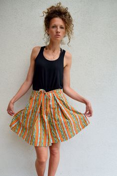 "High waist summer skorts, 60s 70s bohemian shorts, striped hippie shorts, festival wear, M 100% cotton high waist summer skorts. Two side pockets and one more on the bottom. Thick and strong fabric. Size: seems like women's (M) PLEASE CHECK ALL MEASUREMENTS BELLOW: Length: 50cm / 20\" Waist: 70 cm / 28\" Hips: 170 cm / 67\" Inseam: 16 cm / 6\" Fabric: 100% cotton Brand: Mexx Condition: excellent * Wash at temperature not higher than 30oC / 86oF KEEP IN MIND: Photo might be slightly different fr Summer Multicolor Skort With Built-in Shorts, Hippie Beach Shorts For Spring, Vintage Mini Skirt For Summer, Multicolor Skort With Built-in Shorts For Summer, Casual Striped Mini Skirt For Summer, Retro Summer Shorts, Summer Festival Mini Skirt, Retro Cotton Summer Skirt, Hippie Cotton Mini Skirt For Spring