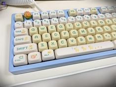 a computer keyboard sitting on top of a desk