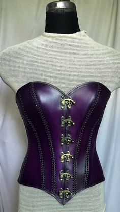 It is handmade leather corset with hand-sewn leather detailing. At front is closed with Lock and back side is adjustable with buckles. We used about 2 to 2.2 mm thick handmade leather. It is hand dyed handmade leather. It is crazy for Gothic, Steampuck costumes and medieval events and Larp.   Corset is hand made from sturdy top-grain leather.  Size is available from 30 to 46 inch, please check our size chart. Bust size in size-chart. DETAILS: ► 100% Handmade ► 100% Genuine leather ► Made on your Punk Corset For Halloween Larp, Punk Underbust Corset For Fantasy Events, Steampunk Leather Corset For Cosplay, Punk Style Corset For Fantasy Events, Fitted Leather Corset For Cosplay, Steampunk Corset For Festival, Steampunk Corset Belt For Fantasy Events, Gothic Leather Corset For Cosplay, Leather Steampunk Fitted Corset