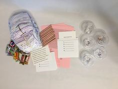 the contents of a diaper and other items are laid out on top of each other