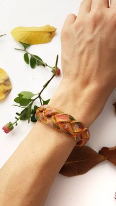 Braided Leather Bracelet, Mystery Braid Wristband, Stackable Handpainted Leather Jewelry, Camel Bohe Handmade Yellow Cuff Bracelet, Bohemian Brown Wristlet For Gift, Adjustable Yellow Bohemian Cuff Bracelet, Adjustable Bohemian Yellow Cuff Bracelet, Unique Adjustable Multicolor Leather Bracelet, Artisan Multicolor Leather Bracelet For Festival, Multicolor Bohemian Leather Bracelet As Gift, Handmade Multicolor Bohemian Leather Bracelet, Bohemian Multicolor Handmade Leather Bracelet