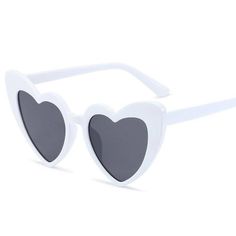 The Chanel Heart Frame Sunglasses are a playful yet sophisticated accessory that adds a touch of glamour to any outfit. Ideal for fashion-forward individuals who love to make a statement, these women's heart-shaped sunglasses combine iconic design with modern flair. Iconic Heart-Shaped Frames The women's heart-shaped sunglasses feature eye-catching heart-shaped frames that are both whimsical and chic. These frames add a fun, romantic touch to your look, making them perfect for anyone who loves t Trendy White Sunglasses For Valentine's Day, Trendy Heart Print Sunglasses For Valentine's Day, Trendy Heart Shaped Tinted Sunglasses, White Heart-shaped Sunglasses For Summer, Trendy Valentine's Day Sunglasses With Heart Print, Heart-shaped Sunglasses With Heart Print For Party, White Heart-shaped Sunglasses For Valentine's Day, White Heart-shaped Sunglasses With Gradient Lenses, Trendy Heart-shaped Sunglasses For Spring