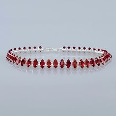 Brand New Women's Ruby Oval Gemstone Tennis Bracelet 14k White Gold Plated Sterling Silver Genuine 2ct Natural Red Ruby Oval Cut Gemstones 7" (Most Common Women's Size) 5mm Width Retail Price $350 Buy With Confidence From A Trusted Seller With A 99%+ Feedback Rating! A0353 (Id-674) Elegant Red Tennis Bracelet For Anniversary, Classic Red Jubilee Bracelet, Red Sterling Silver Jubilee Bracelet, Red Oval Tennis Bracelet For Anniversary, Elegant Red Round Crystal Bracelet, Adjustable Red Oval Bracelet, Adjustable Red Oval Bracelets, Formal Red Crystal Bracelets, Formal Red Tennis Bracelet