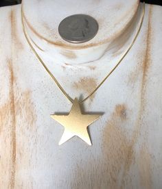 "I'll fabricate this star necklace, in sterling silver, with a 24K gold plating on both the star pendant and the 18\" sterling silver box chain. This is a 5 point star which is 1 1/8 inches in diameter, so it's a substantial size (not minuscule) and will stand out upon your chest when worn. It's 22 gauge in thickness. It's inspired after Stevie Nicks' smaller sized star necklace. For those enjoying the simple style of star necklaces, then here's a perfect one to last a lifetime of wear and enjoy Star Necklaces, 5 Point Star, Silver Star Necklace, Star Celestial, Star Necklace Silver, Star Pendant Necklace, Silver Box, Felt Bag, Stevie Nicks