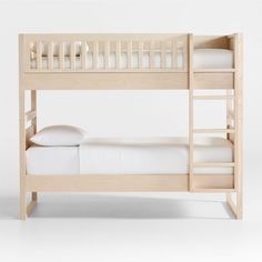 a wooden bunk bed with white sheets and pillows on top of it, against a white background