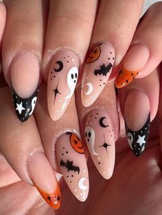 nude almond acrylic nails with cute Halloween  characters Aesthetic Nails Halloween, Nail For Halloween, Halloween Autumn Nails, Nail Ideas Acrylic Halloween, Halloween Nails With Stickers, Almond Nails Halloween Designs, Spooky Halloween Nails Almond, Holiday Nails Halloween, Spooky Season Nails Almond