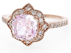 Bella Luce® pink and white diamond simulants 6.12ctw round and square cushion Eterno™ 18k rose gold over sterling silver Starry Cut ring. Measures approximately 0.81"L x 0.56"W and is not sizable. The diamond equivalent weight is 3.70ctw. Pink Cubic Zirconia Ring, Elegant Pink Gold Jewelry With Center Stone, Fine Jewelry In Pink Gold With Halo Setting, Cushion Cut Pink Cubic Zirconia Jewelry, Pink Cushion Cut Cubic Zirconia Jewelry, Rose Gold Cushion Cut Jewelry With Diamond Accents, Cushion Cut Rose Gold Jewelry With Diamond Accents, Pink Cushion Cut Diamond Ring Gift, Pink Cushion Cut Diamond Jewelry