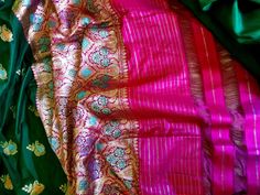 For sale a gorgeous Indian Banarsi pure silk saree, in green, pink and gold colors, woven with silk and gold thread, with paisley and floral motifs. Section for the choli is still part of the saree, see last photo. Size lenght 540 cm x width 110 cm. Green Paithani Silk Dupatta With Traditional Patterns, Green Traditional Wear With Katan Silk Patterns, Green Katan Silk Dupatta For Traditional Ceremonies, Green Paithani Silk Dupatta For Traditional Ceremonies, Green Jamawar Saree For Puja, Green Jamawar Dupatta For Puja, Green Jamawar Traditional Wear For Puja, Green Katan Silk Saree With Zari Weaving, Green Paithani Silk Dupatta With Motifs