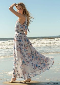 Braided Halter Neck Floral Maxi Dress | LOVESTITCH Spring Maxi Dress For Beach Wedding, Breezy Halter Neck Flowy Maxi Dress, Flowy Halter Neck Breezy Maxi Dress, Breezy Floral Print Maxi Dress, Spring Breezy Halter Neck Maxi Dress, Flowy Spring Halter Maxi Dress, Flowy Maxi Floral Dress With Smocked Back, Flowy Maxi Length Halter Dress For Spring, Spring Flowy Tie Back Maxi Dress