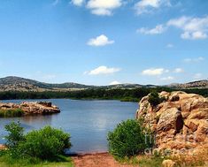 a large body of water surrounded by rocks