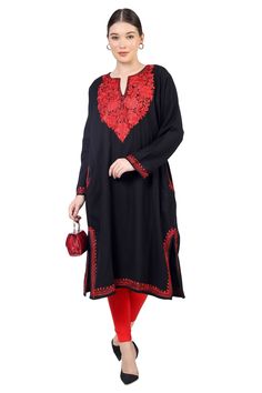 "Kashmiri Aari Embroidered Woolen Pheran.These Pherans Is Made Of Fine Cashmillon Wool Its Embroidered With Aari Work.The Embroidery Done On This Is A Traditional Kashmiri Embroidery Known As 'Aari Work''.It Can Be Matched With Many Outfits  And Pair It Up With A Skirt, Trousers.A Stunningly Marvellous Kurti. These Pherans Features Royal Kashmir Aari Embroidery. Product Details - Condition: Brand New - Handmade - Style: Pheran Tunic - Fabric: Fine Cashmillon Wool - Embroidery: Kashmiri Aari Embr Festive Tunic With Floral Embroidery For Navratri, Festive Floral Embroidered Tunic For Navratri, Festive Floral Embroidery Tunic For Navratri, Embroidered Unstitched Kaftan For Navratri, Embroidered Kaftan For Navratri, Eid Anarkali Tunic With Floral Embroidery, Long Sleeve Kaftan With Resham Embroidery For Navratri, Traditional Long Sleeve Kaftan For Navratri, Diwali Embroidered Straight Kurta Kaftan