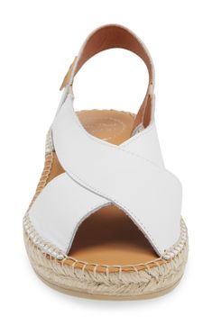 An espadrille-inspired sole enhances the earthy, vintage style of an open-toe sandal featuring smooth leather straps. Leather upper and lining/rubber sole Made in Spain Beach Sandals With Textured Sole And Ankle Strap, Espadrille Slingback Sandals With Round Toe For Vacation, Leather Wedge Sandals With Rubber Sole For Beach, Summer Vacation Wedge Sandals With Leather Sole, Beach Wedge Sandals With Open Heel And Rubber Sole, Open Heel Wedge Sandals With Rubber Sole For Beach, Natural Color Open Toe Wedge Sandals With Textured Sole, Natural Open Toe Wedge Sandals With Textured Sole, Beach Slingback Espadrille Sandals With Round Toe