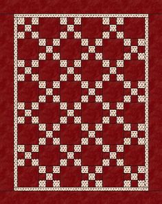 a red and white quilt with squares in the shape of hearts on it, against a maroon background