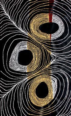 an abstract painting with gold and black circles